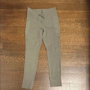 Athleta Salutation Cargo Tight in Olive